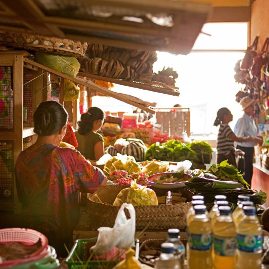 A Group Of People In A Market