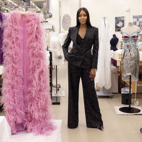Naomi Campbell Standing In A Clothing Store