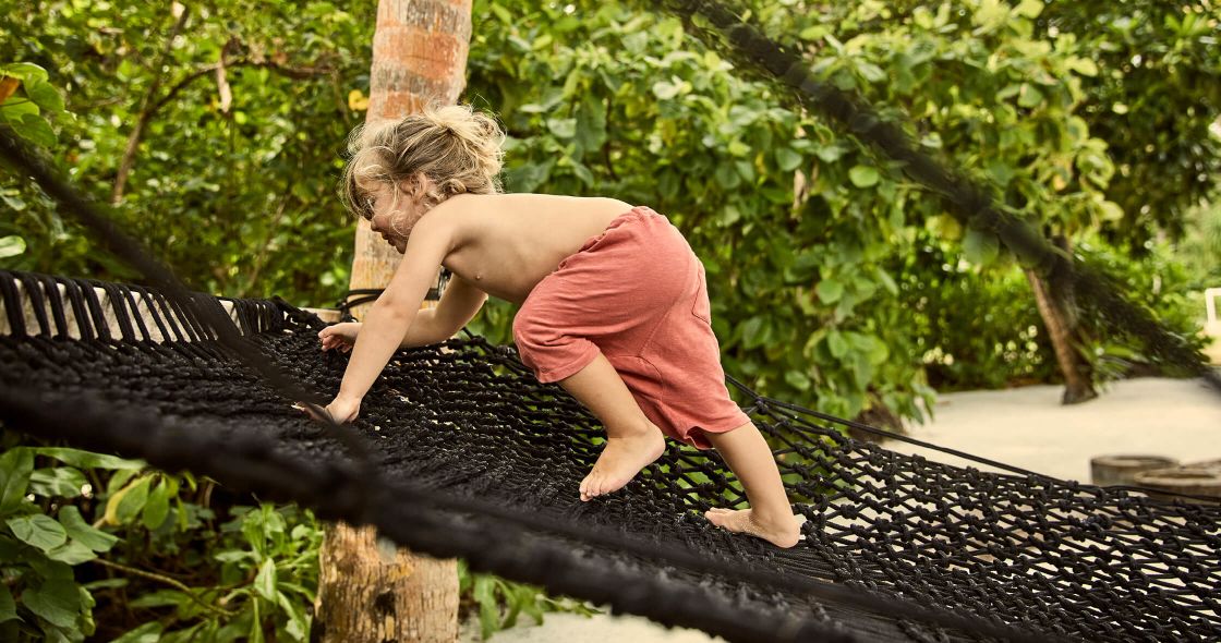 A Child On A Trampoline