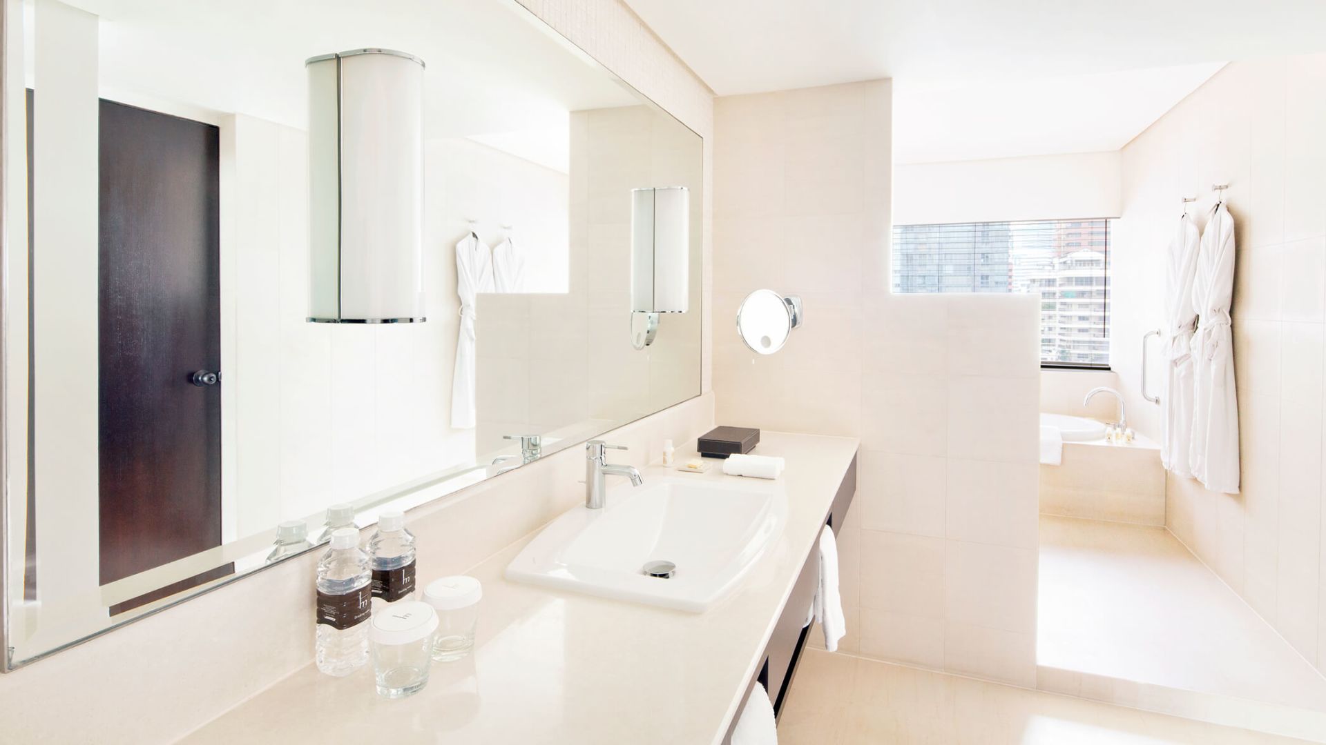 Bathroom with bathtub and spacious vanity - Image