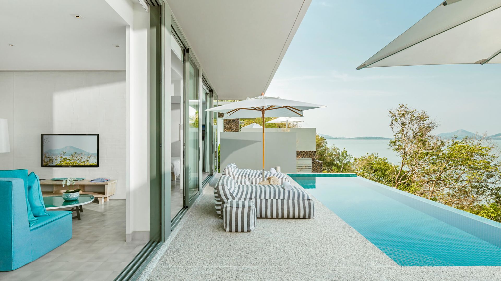 Private pool with outdoor sundeck and sun loungers - Image