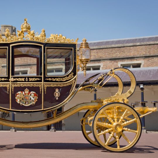 A Carriage With A Large Wheel