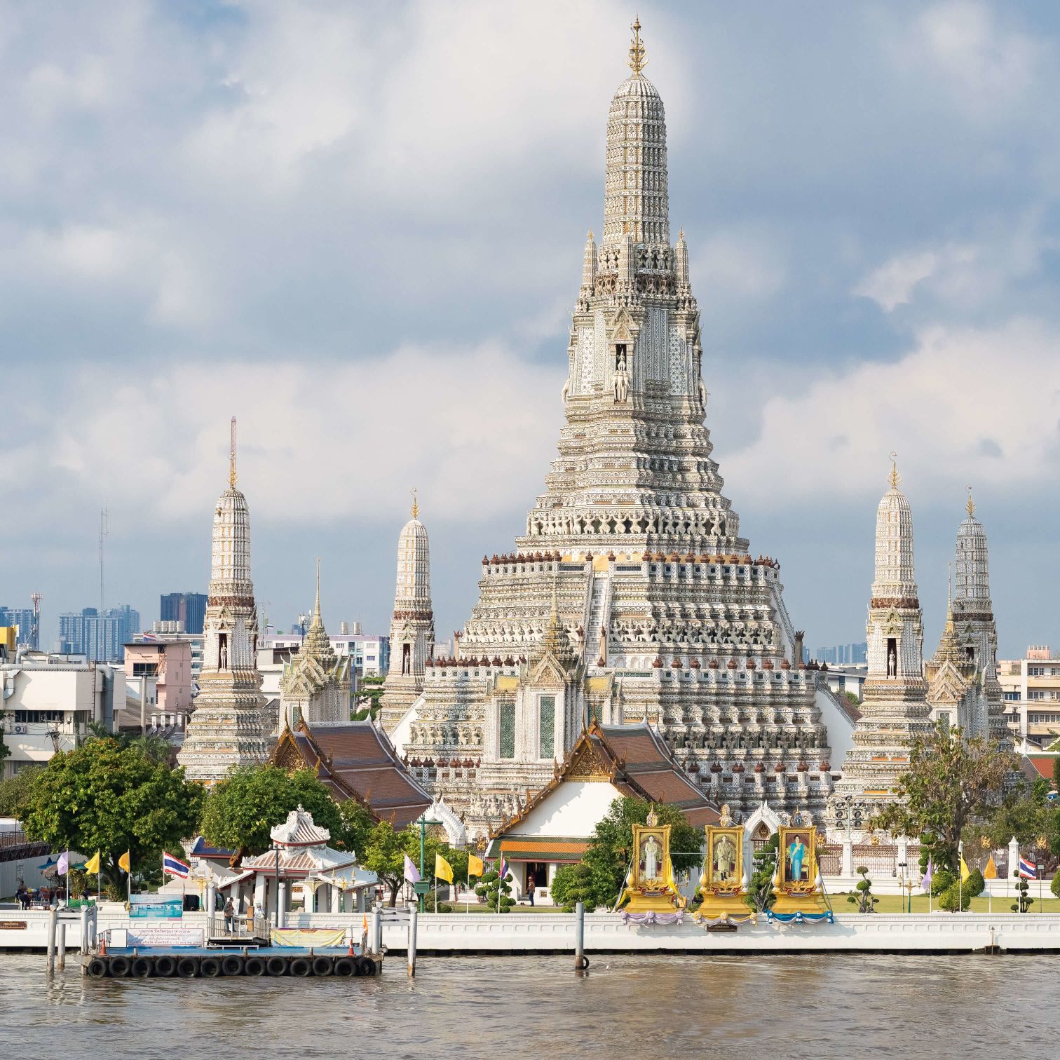 A Large Building With Towers With Wat Arun In The Background