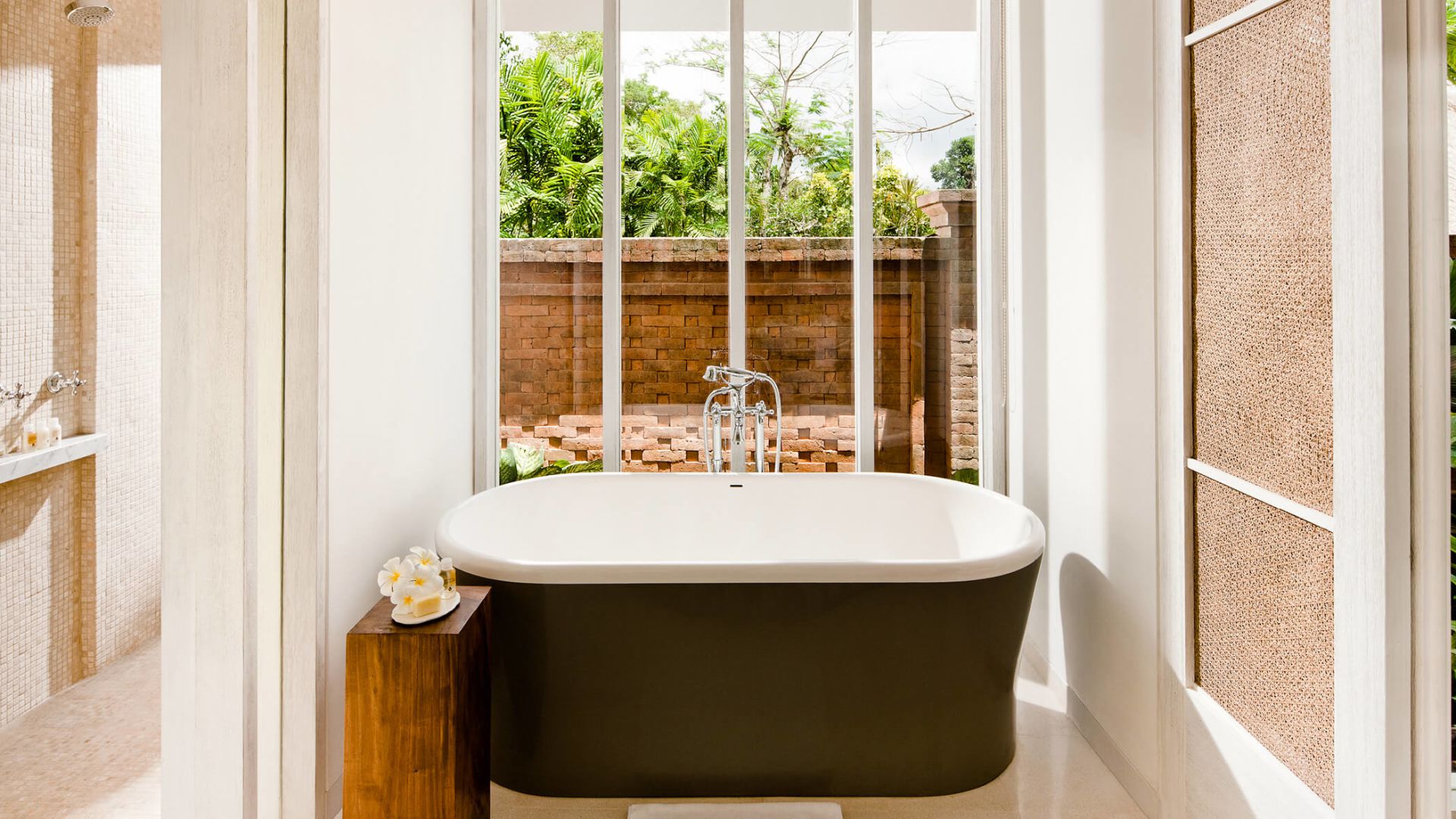 A Bathroom With A Large Window - Image