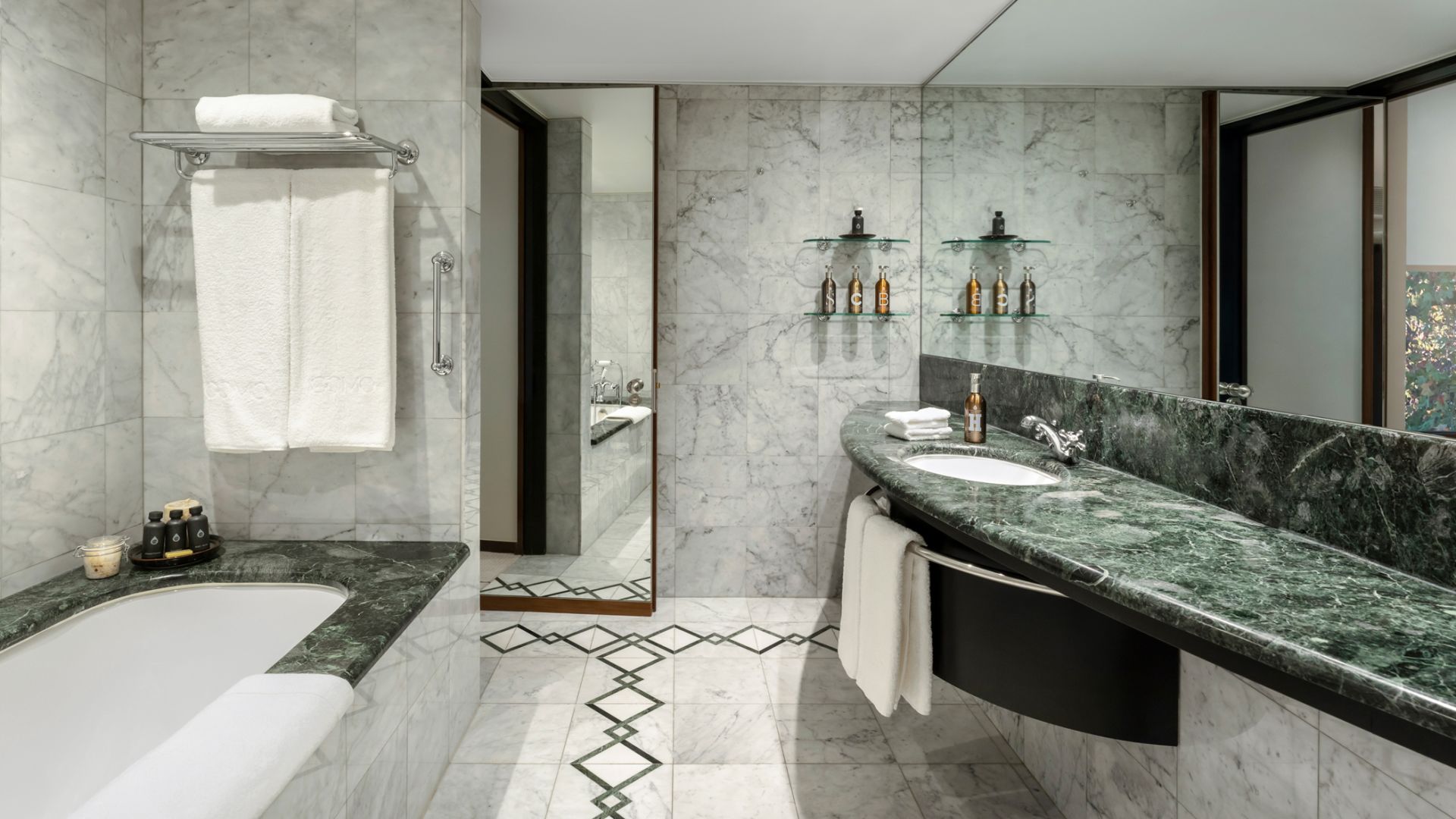 A Bathroom With A Marble Countertop - Image