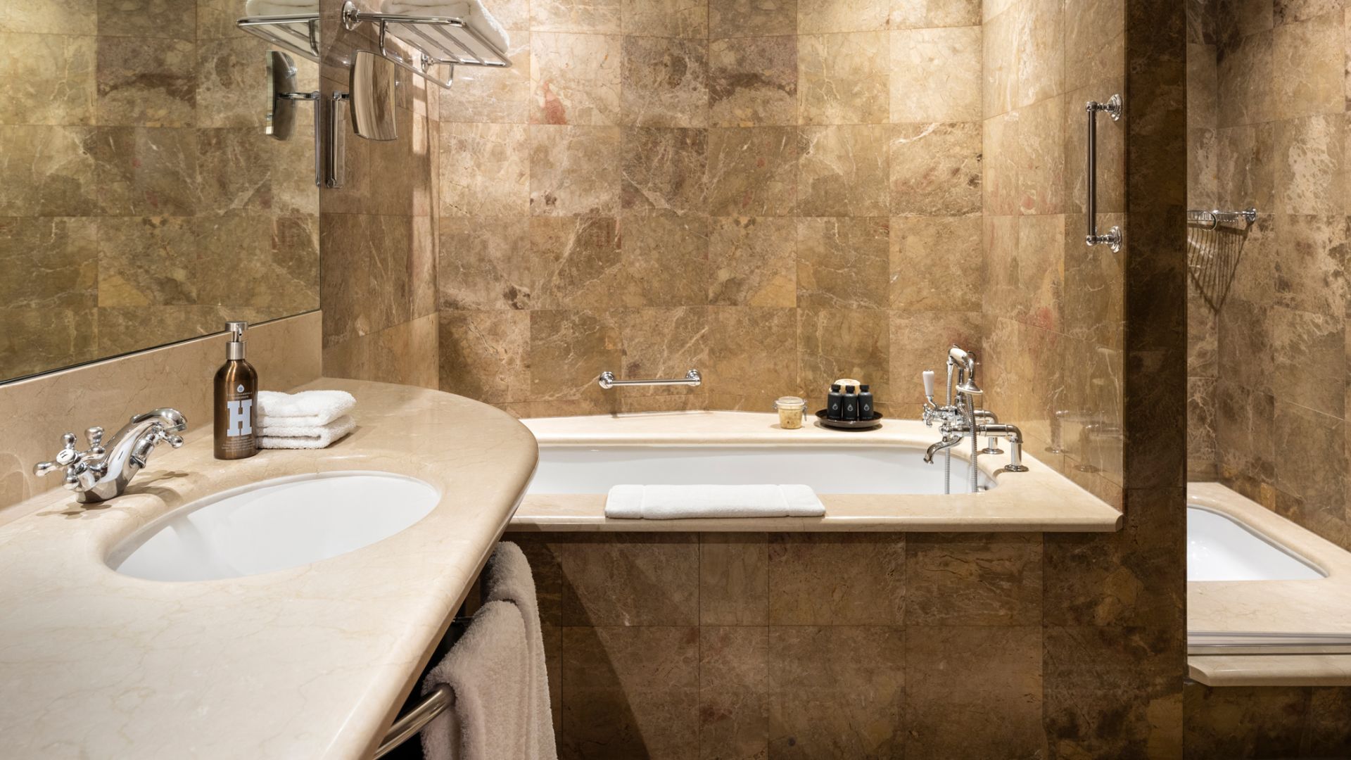 A Bathroom With A Marble Countertop - Image